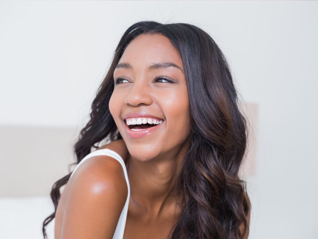 Woman smiling with bright white teeth
